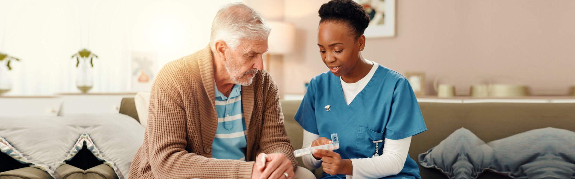 nurse prescibe medicine to elderly man